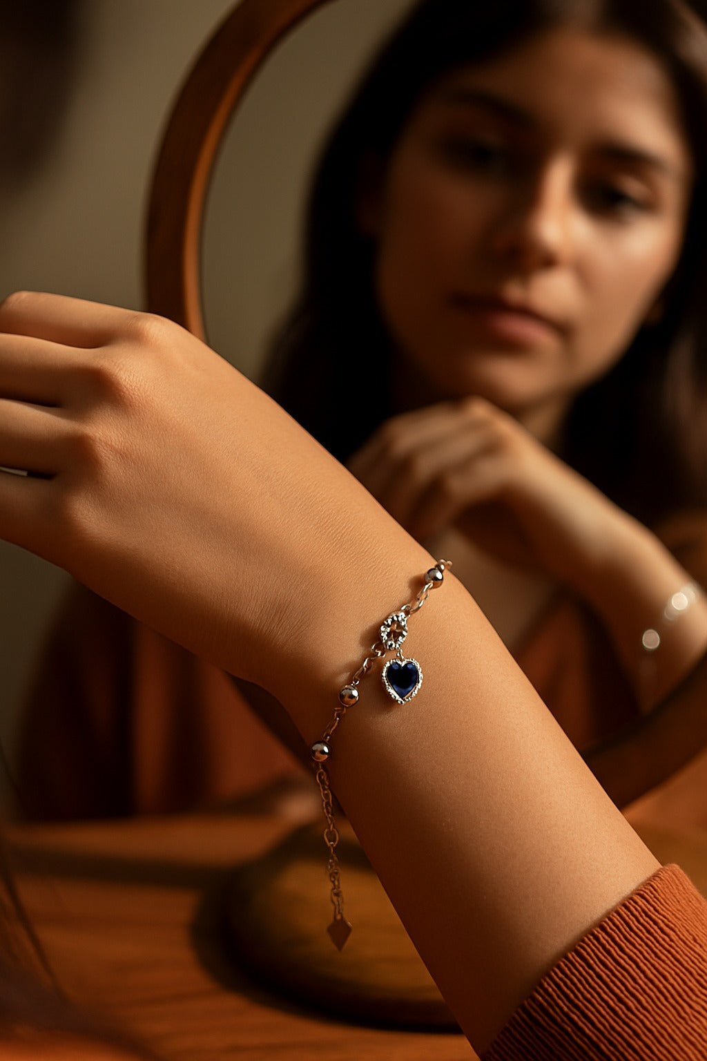 Elegant Heart-Shaped Blue Stone Silver Bracelet with Crystal Accents.
