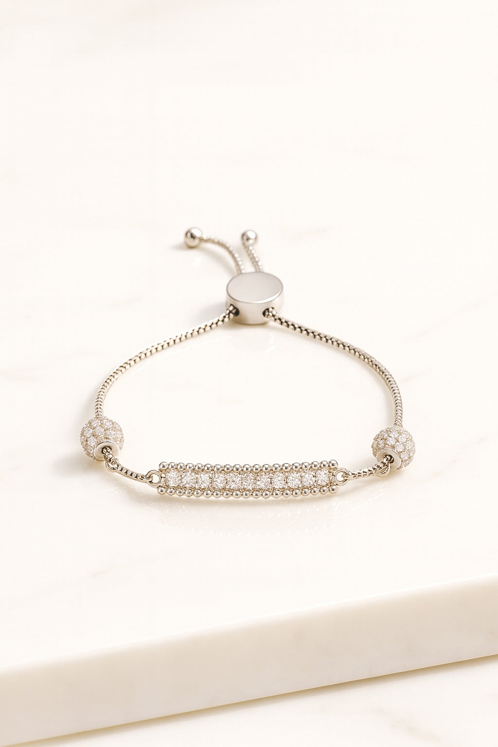 ✨ Adjustable Silver-Tone Bracelet with Sparkling CZ Bar & Beaded Charms ✨