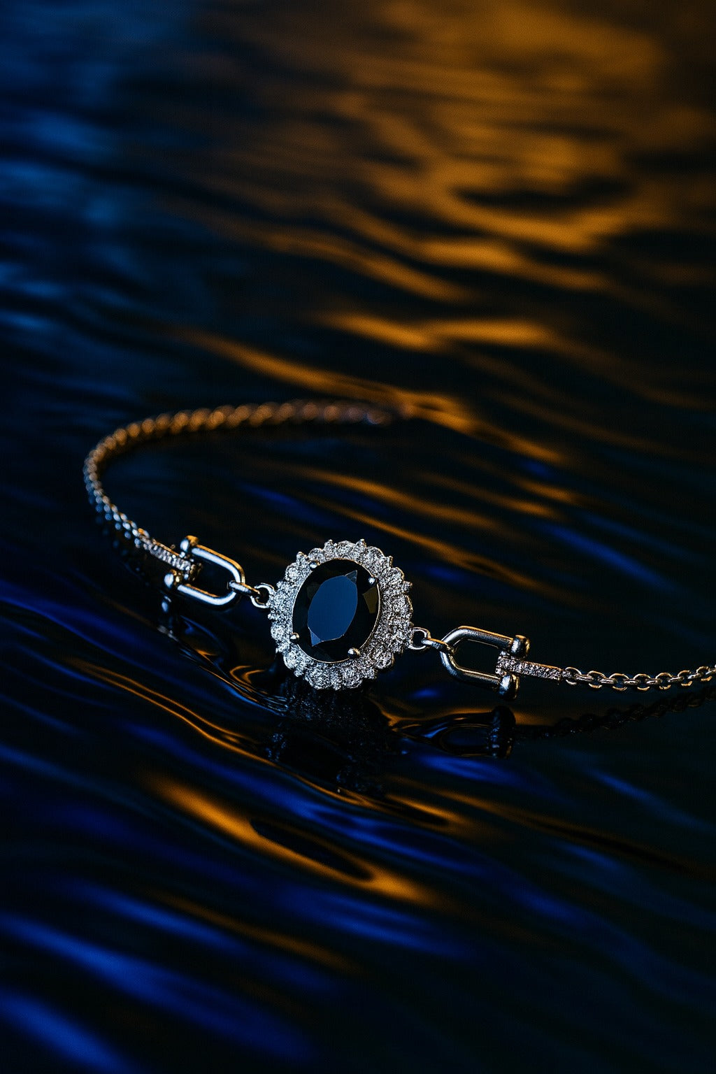 "Elegant Black Oval Stone Bracelet with Sparkling Halo Accents"
