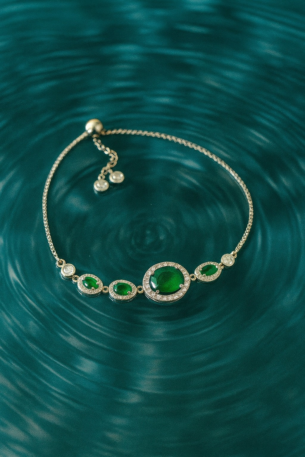 Elegant Silver Bracelet with Oval Green Gemstones and CZ Diamond Accents