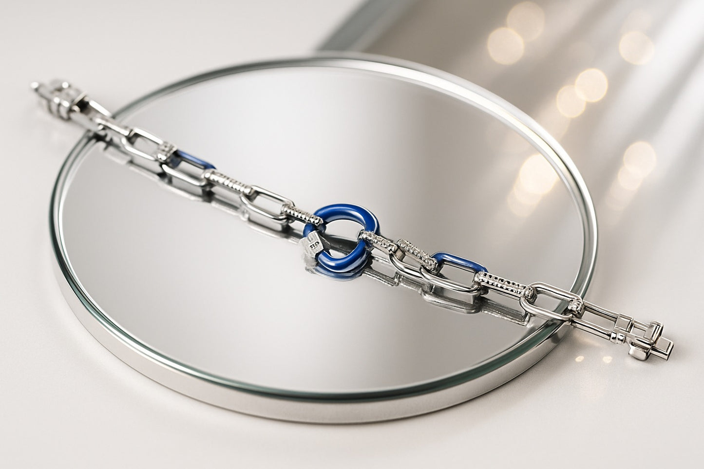 Modern Chain-Link Bracelet with Blue Enamel and Sparkling Accents.