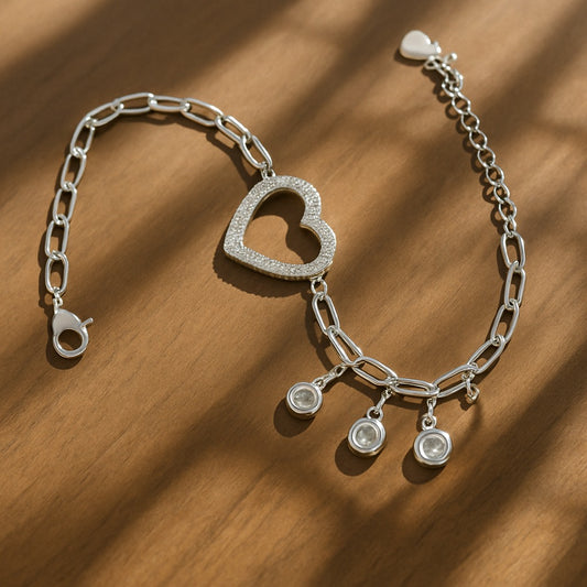 Sparkling Heart Charm Bracelet with Crystal Accents.