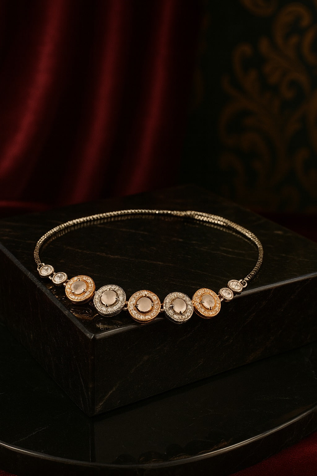 "Elegant Dual-Tone Bracelet with Crystal-Studded Circular Charms"