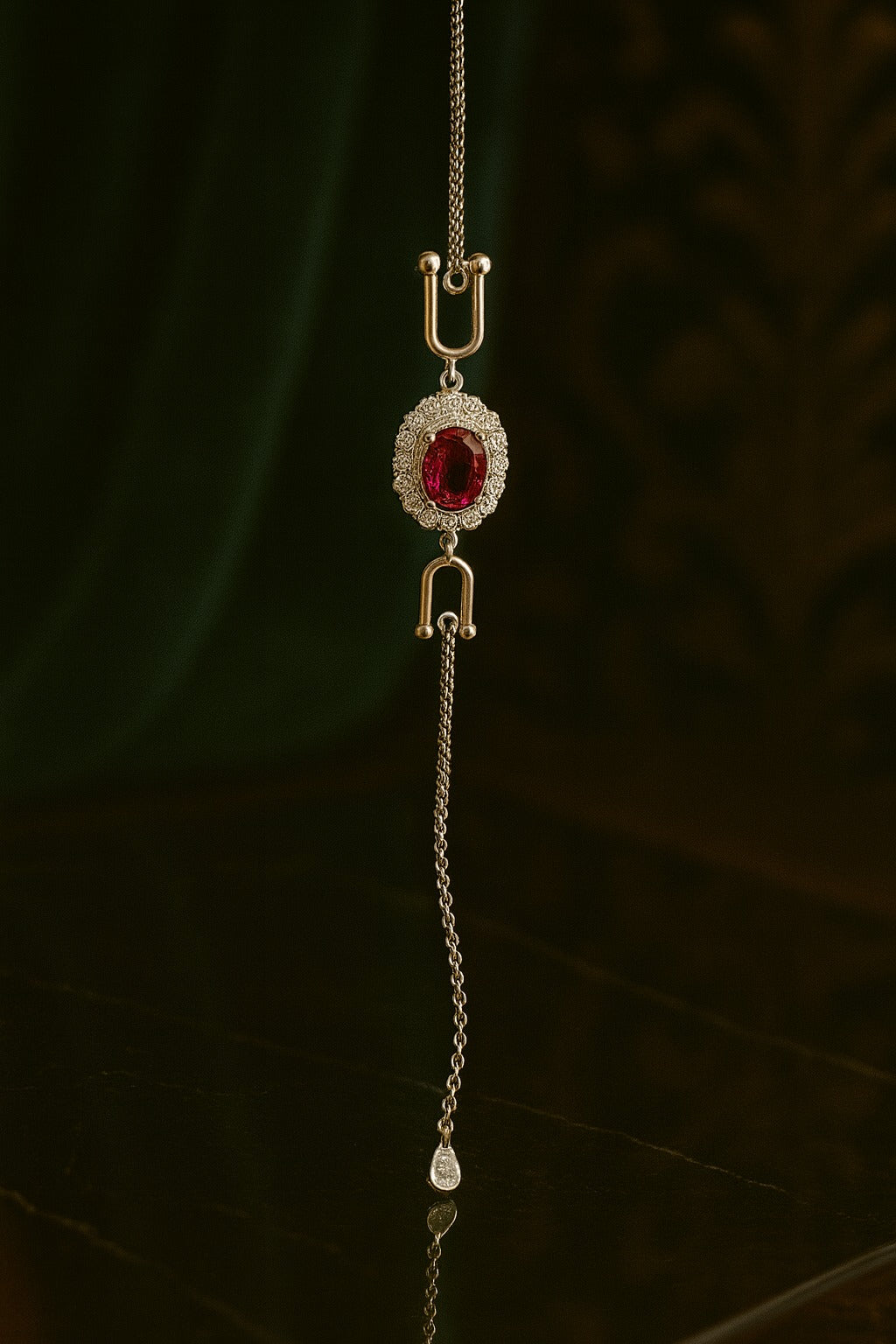 "Elegant Silver Bracelet with Pink Oval Gemstone and Diamond Halo"