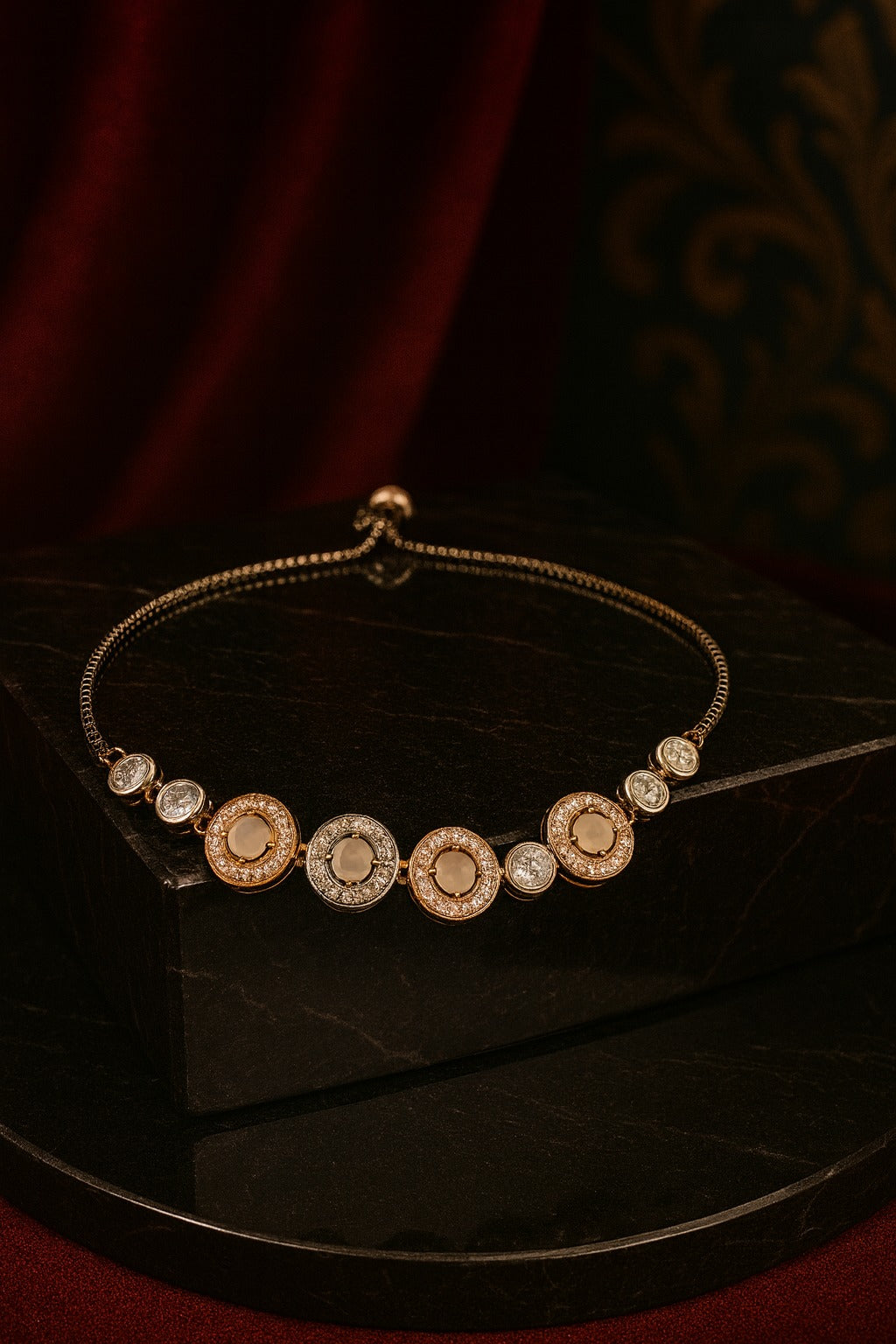"Elegant Dual-Tone Bracelet with Crystal-Studded Circular Charms"