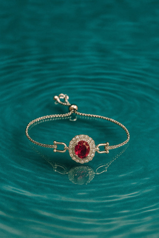 "Elegant Silver Bracelet with Pink Oval Gemstone and Diamond Halo"