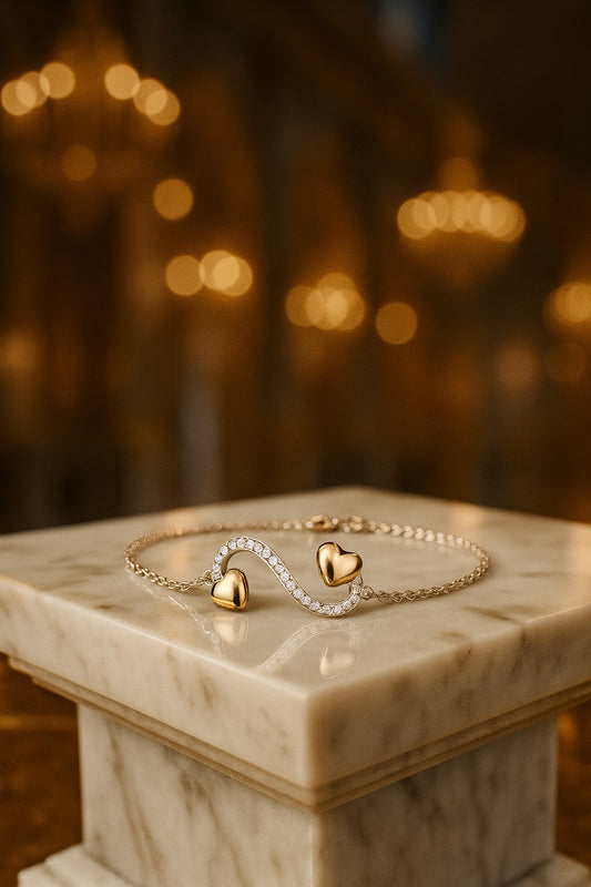 "Delicate Silver Chain Bracelet with Twin Heart Charm and Sparkling Curve Design"
