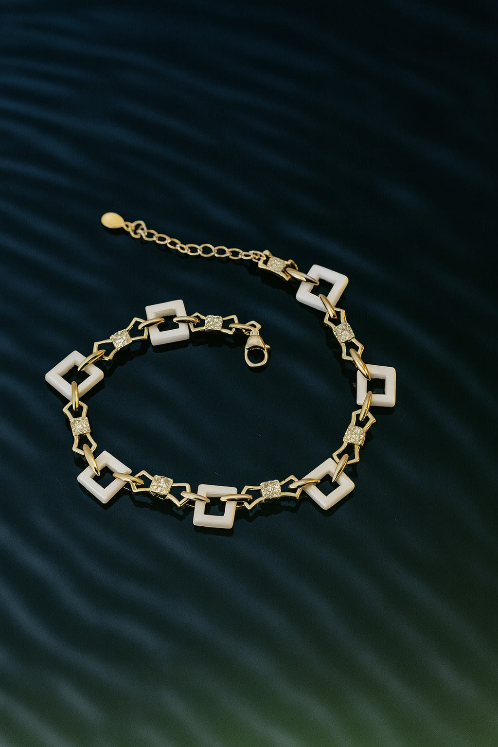 "Elegant Geometric Silver Bracelet with White Square Links & Sparkling Accents"