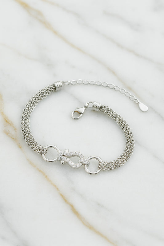 "Elegant Silver Multi-Chain Bracelet with Designer Clasp"