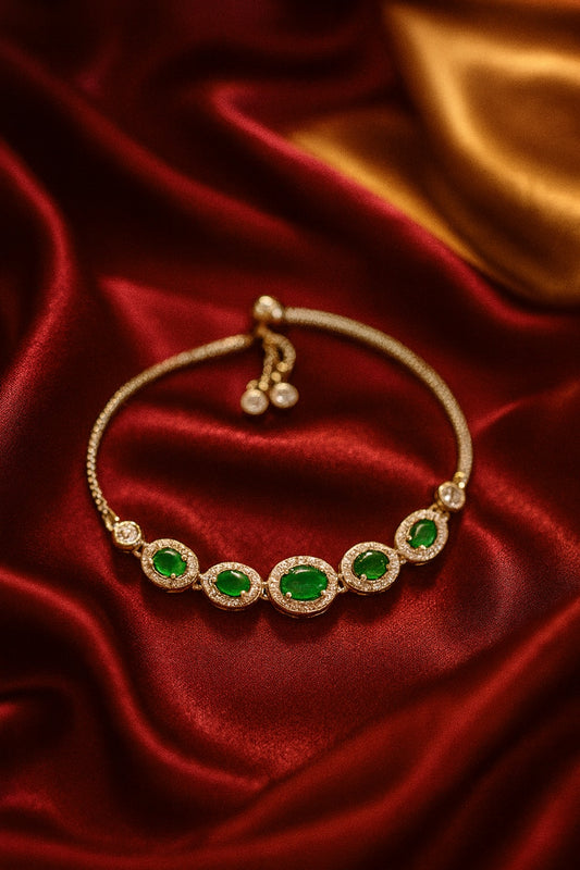 Elegant Silver Bracelet with Oval Green Gemstones and CZ Diamond Accents