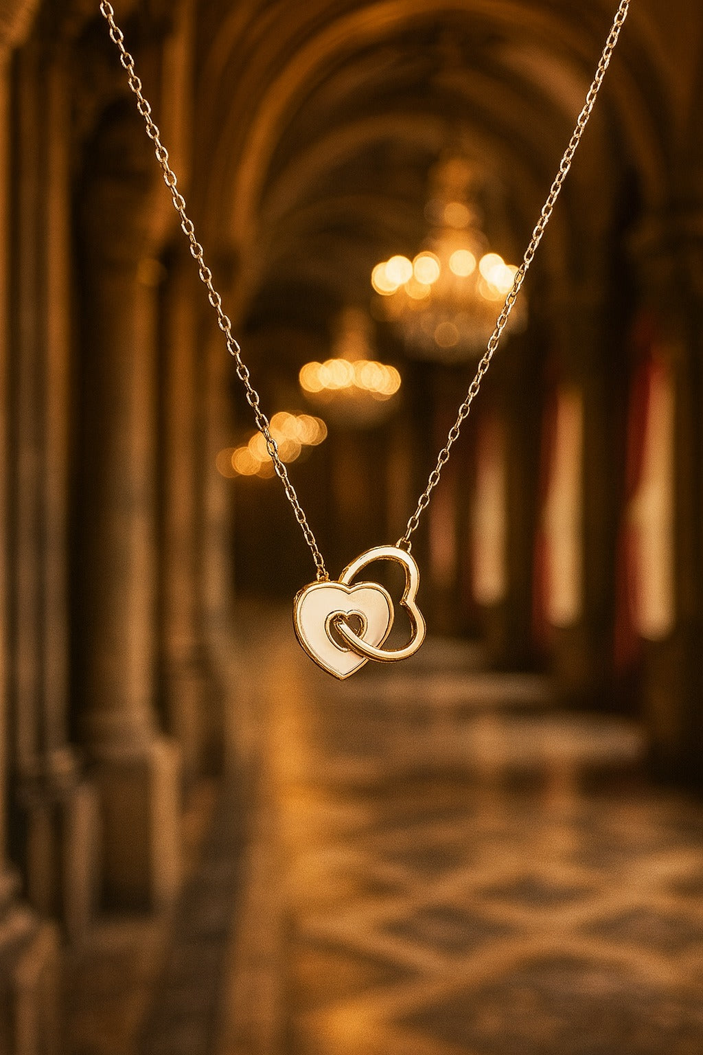 “Elegant Silver Chain with Dual Interlocking Heart Pendant”
